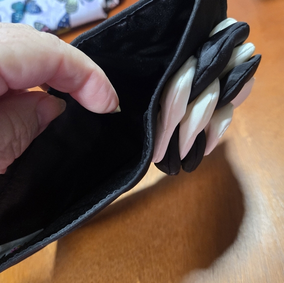 Ladies black wallet with big white and black flower on the front. - Picture 3 of 6